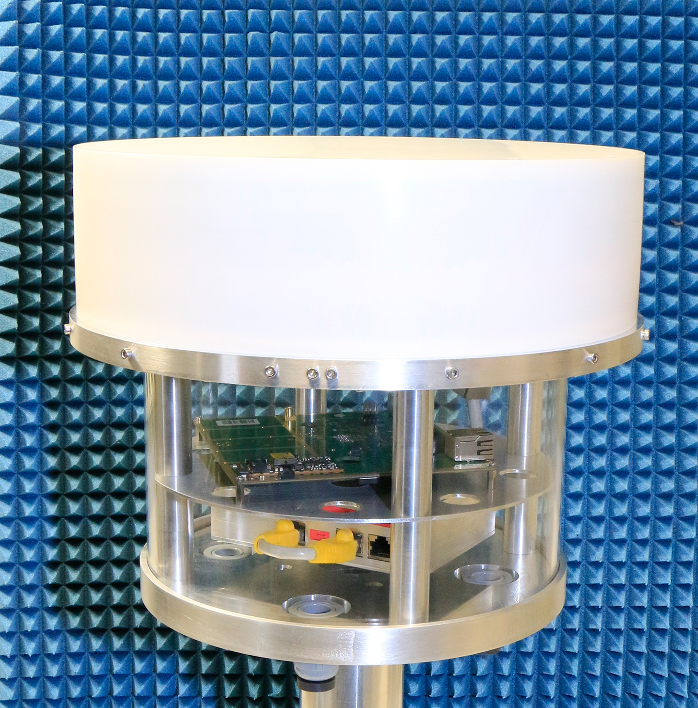 The Q-band prototype with housing for the communications and control electronics below the antenna.